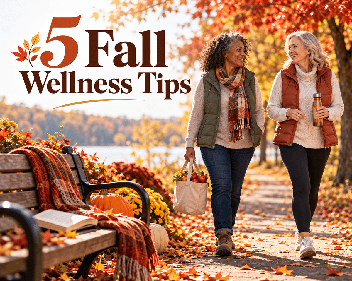 Two smiling women enjoying a fall walk along a tree-lined path, surrounded by colorful autumn foliage. A park bench with pumpkins, flowers and a cozy blanket complements the headline “5 Fall Wellness Tips.”